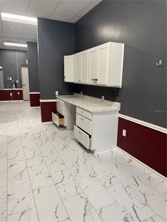 a living room with hard wood walls