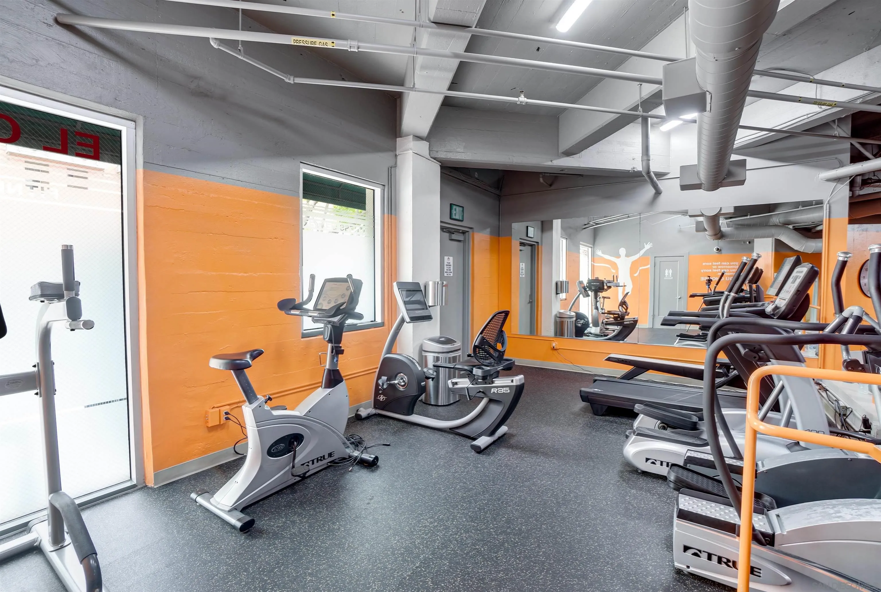 702 Ash Street, Unit 102 San Diego, CA 92101 - Photo 22 of 31 a view of a room with gym equipment