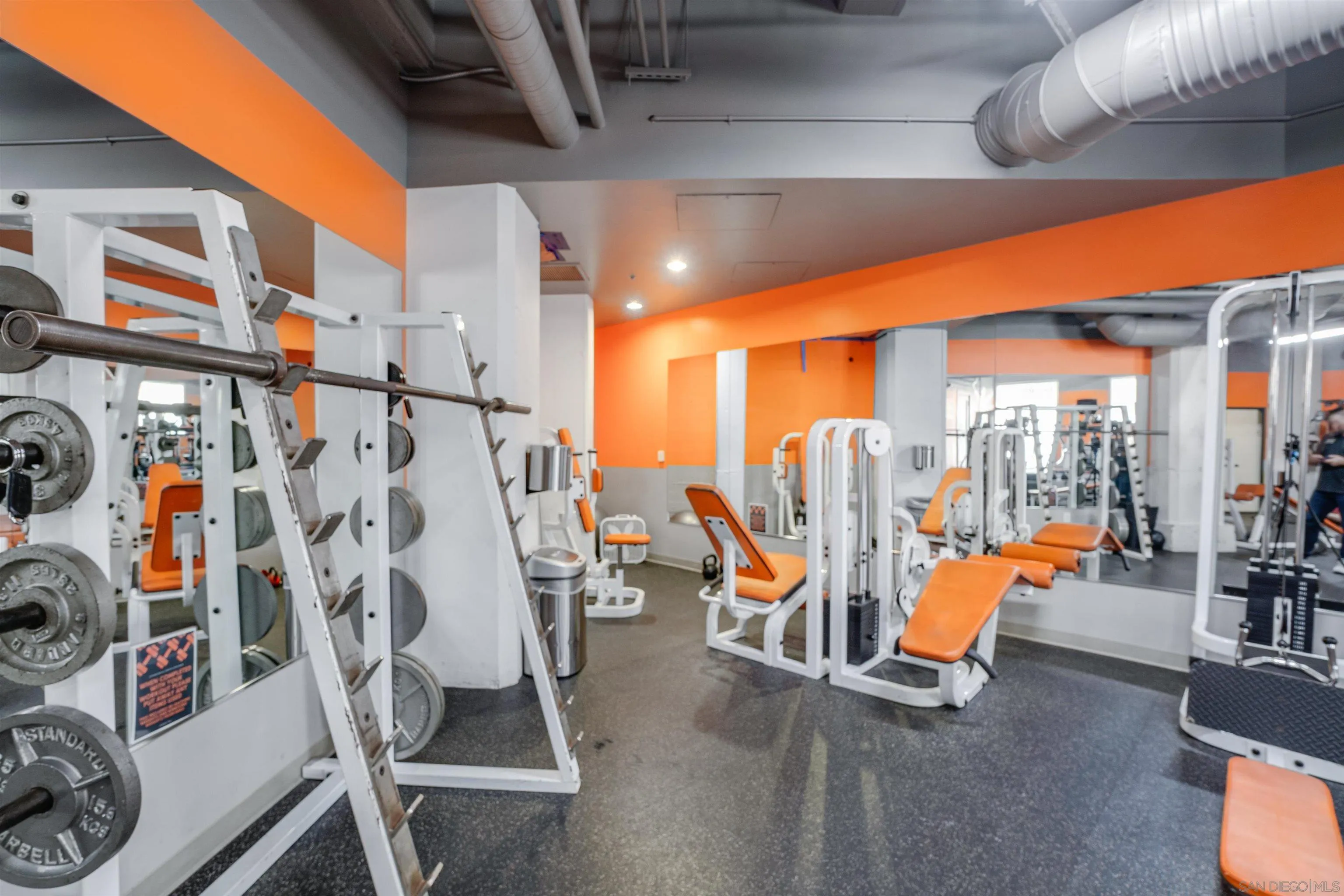 702 Ash Street, Unit 102 San Diego, CA 92101 - Photo 23 of 31 a view of a room with gym equipment
