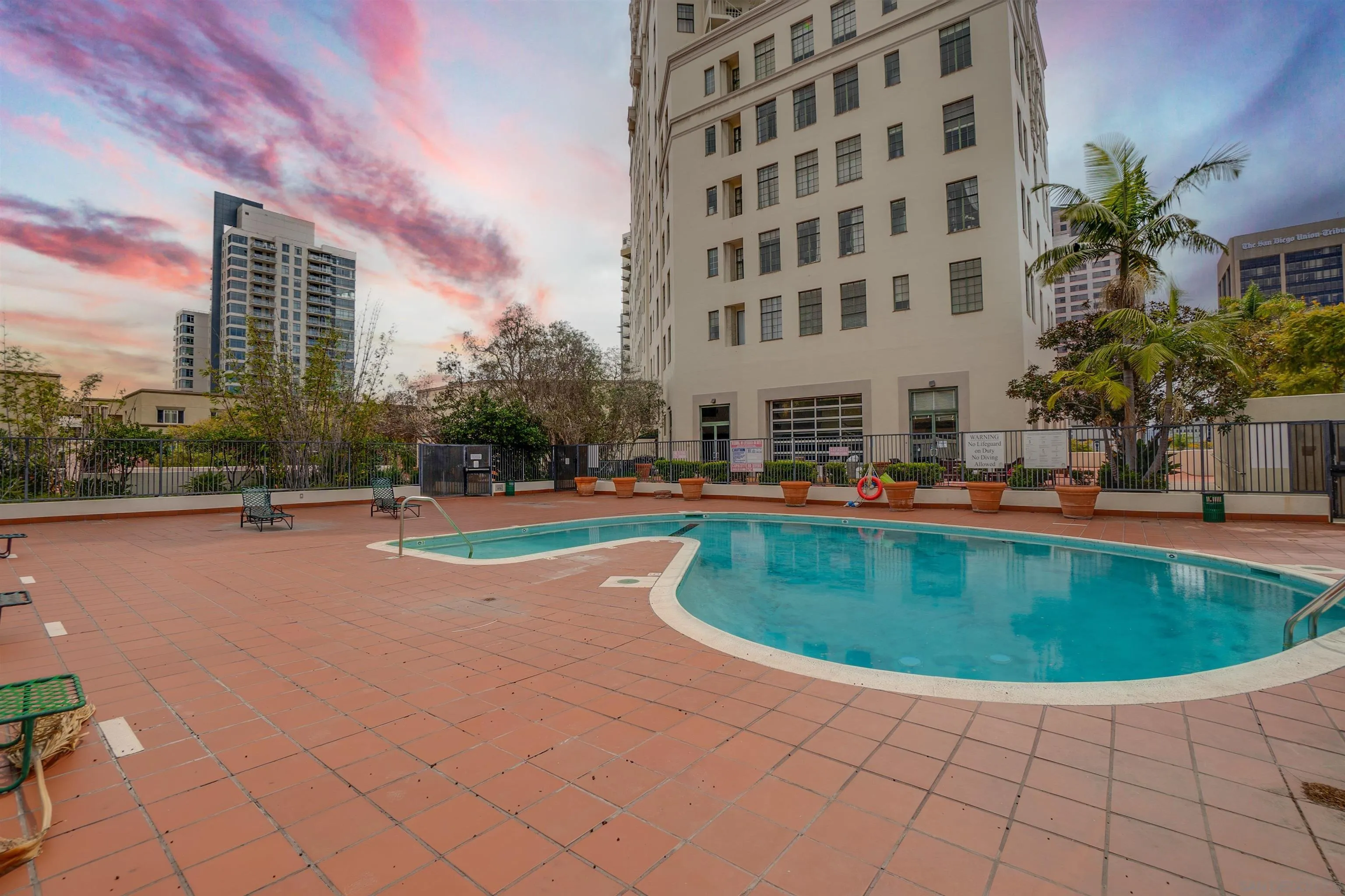 702 Ash Street, Unit 102 San Diego, CA 92101 - Photo 28 of 31 a view of a swimming pool with a patio