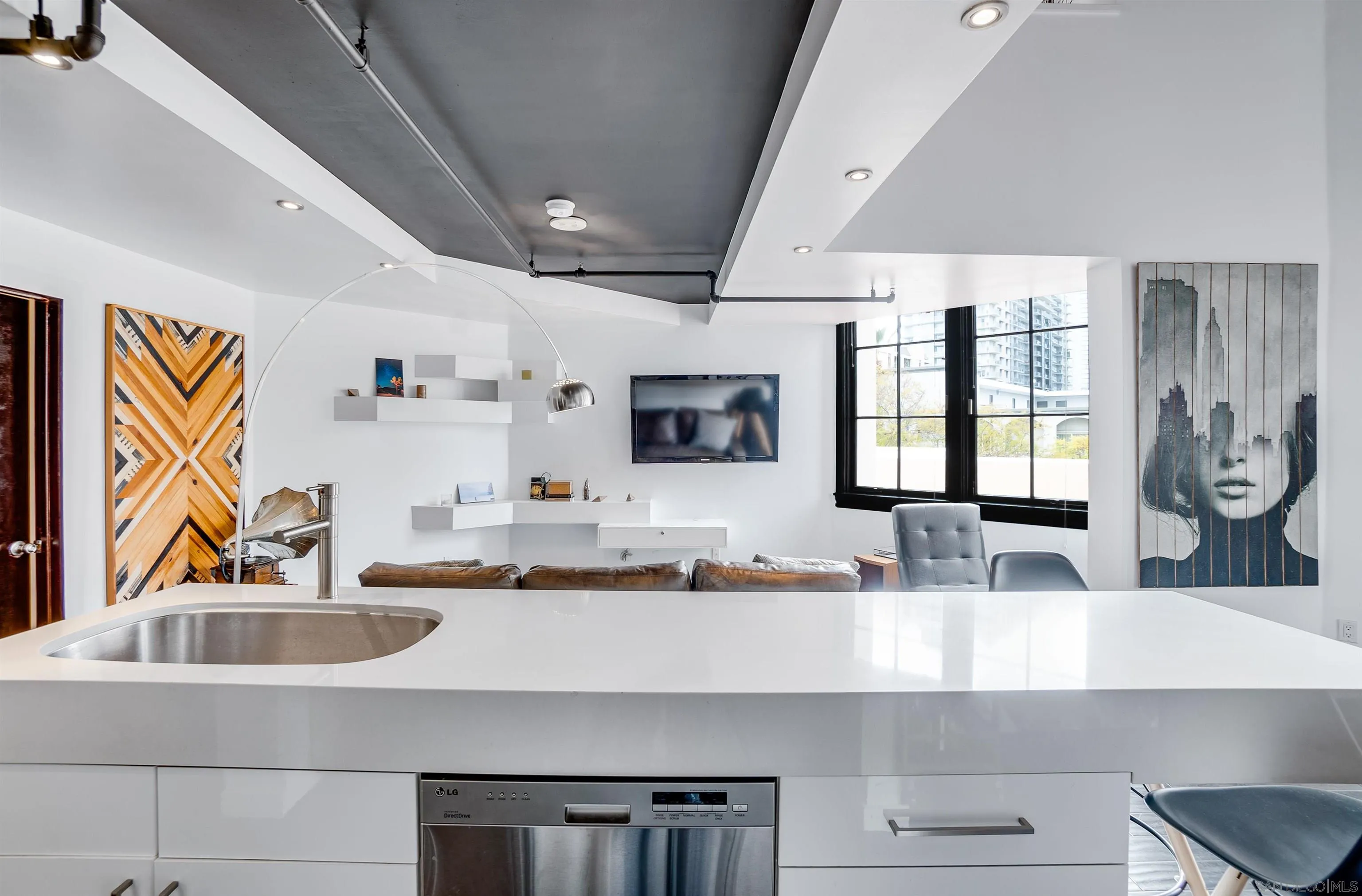 702 Ash Street, Unit 102 San Diego, CA 92101 - Photo 9 of 31 a bathroom with a sink and a mirror