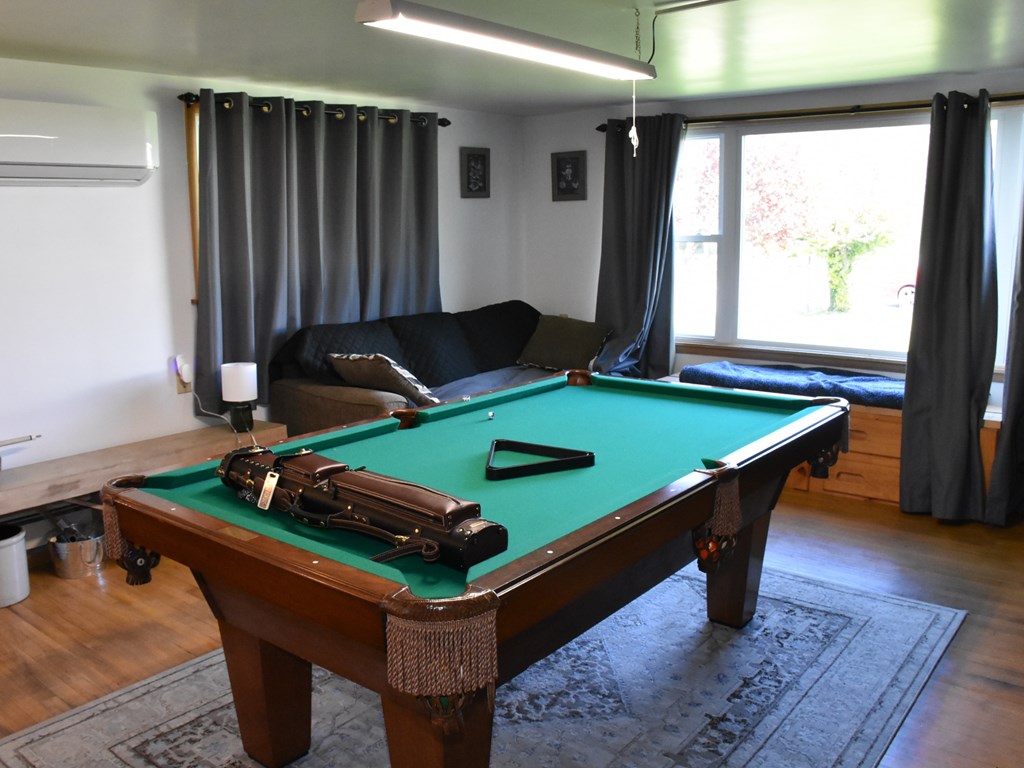 1334 Cochranton Road Carlton, PA 16311 - Photo 15 of 49 a room with pool table and windows