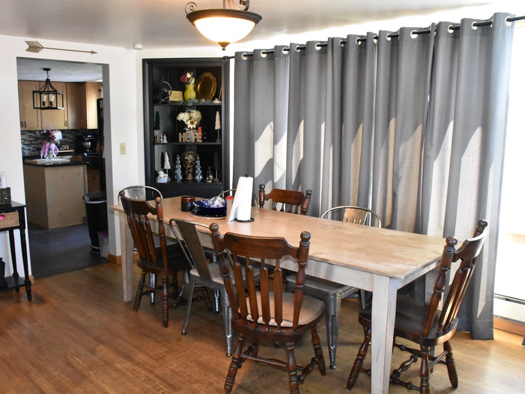 1334 Cochranton Road Carlton, PA 16311 - Photo 19 of 49 a dining table with chairs and wooden floor