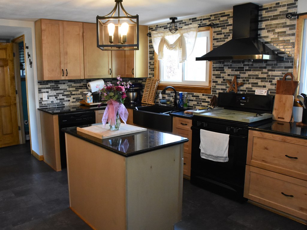 1334 Cochranton Road Carlton, PA 16311 - Photo 22 of 49 a kitchen with a stove and a refrigerator