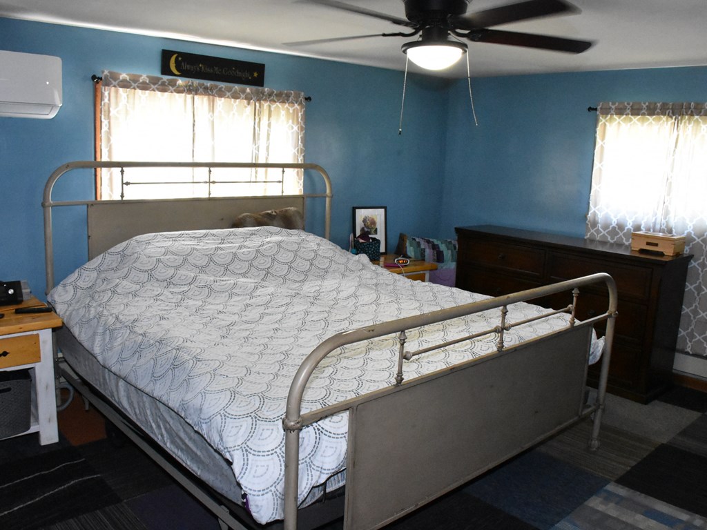 1334 Cochranton Road Carlton, PA 16311 - Photo 27 of 49 a bed sitting in a bedroom next to a window