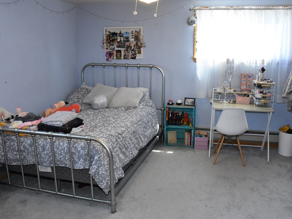 1334 Cochranton Road Carlton, PA 16311 - Photo 33 of 49 a bedroom with a bed and a table in it