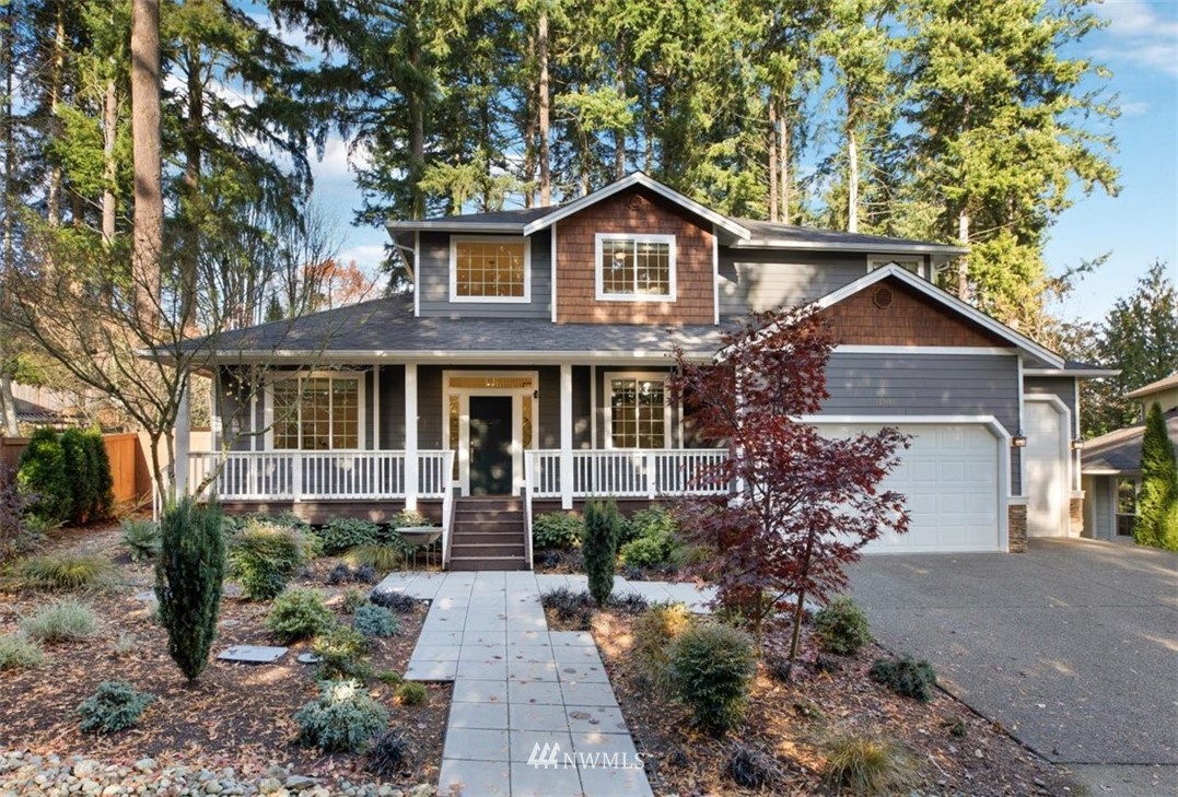 18906 Ross Road Bothell, WA 98011 - Photo 1 of 34 a front view of a house with garden