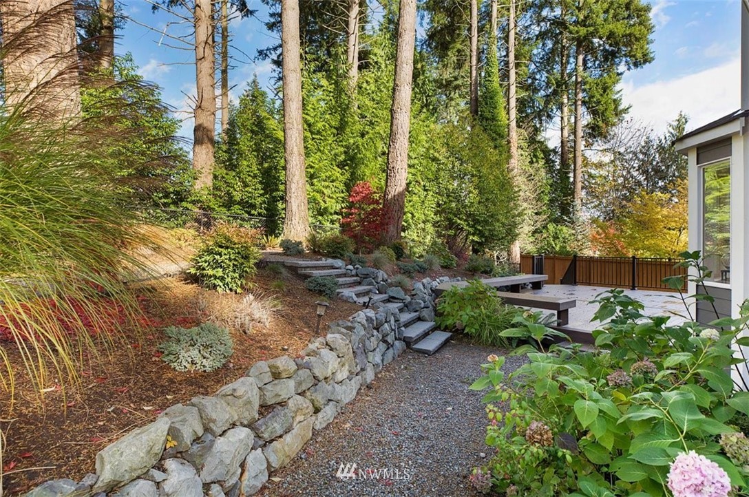 18906 Ross Road Bothell, WA 98011 - Photo 2 of 34 a garden view with a seating space