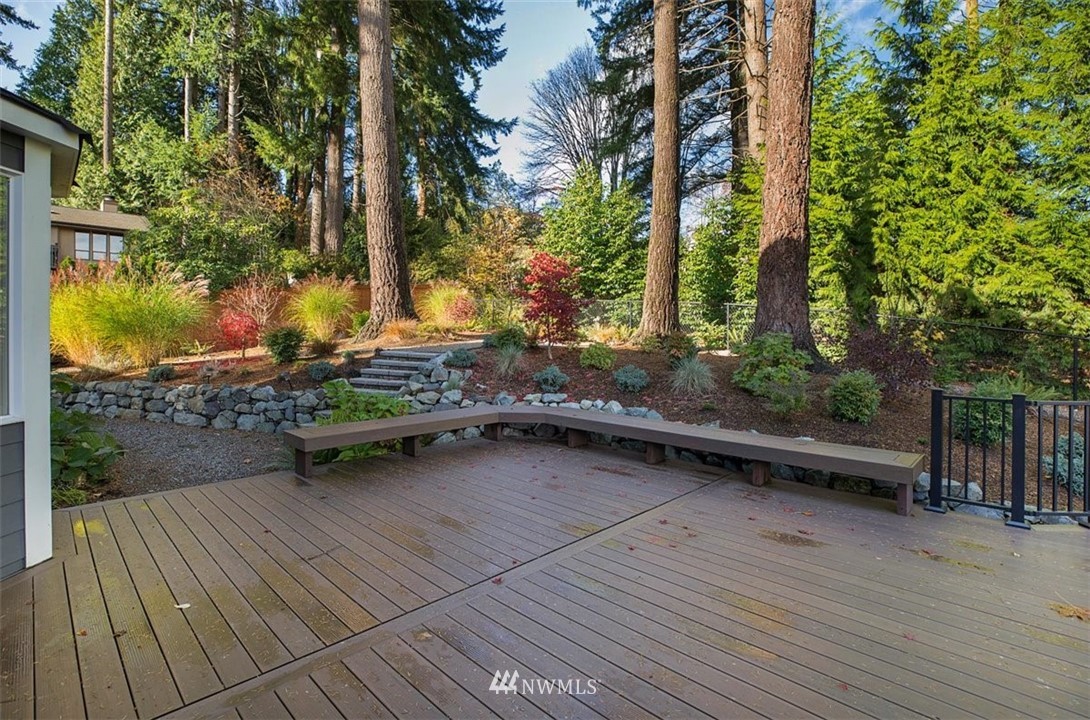 18906 Ross Road Bothell, WA 98011 - Photo 19 of 34 a view of a deck with chairs and wooden fence