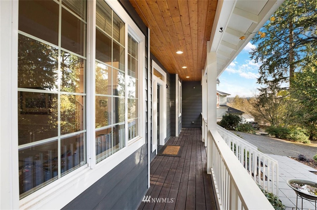 18906 Ross Road Bothell, WA 98011 - Photo 3 of 34 a view of balcony with wooden floor and fence
