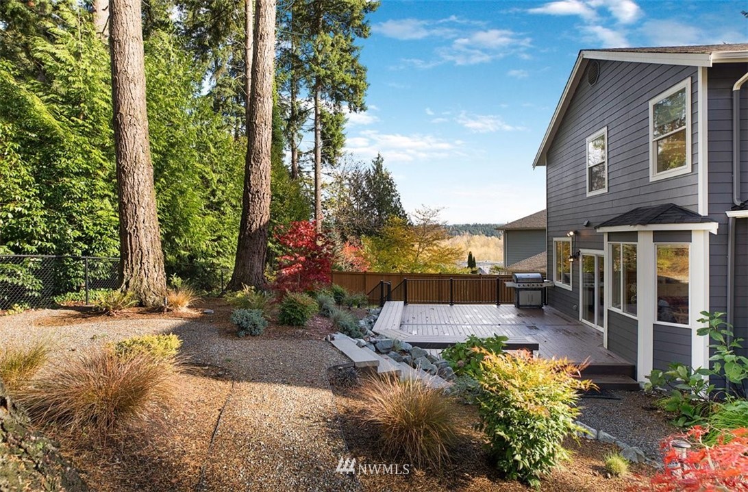 18906 Ross Road Bothell, WA 98011 - Photo 31 of 34 front view of a house with a yard