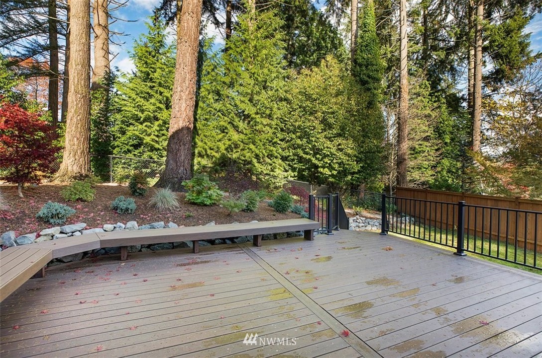 18906 Ross Road Bothell, WA 98011 - Photo 32 of 34 a view of a balcony with two chairs and a table