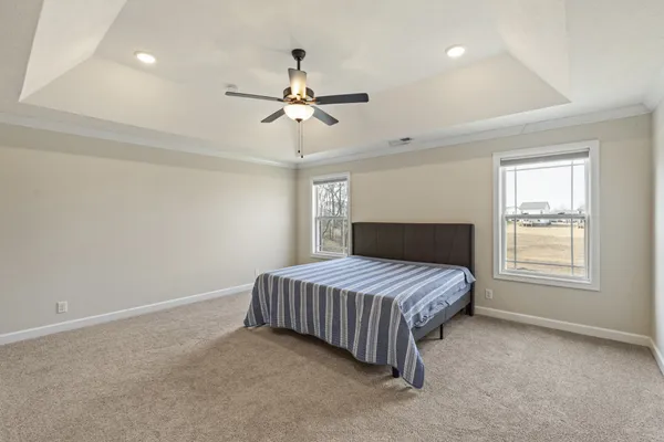 a bathroom with a double vanity sink and mirror
