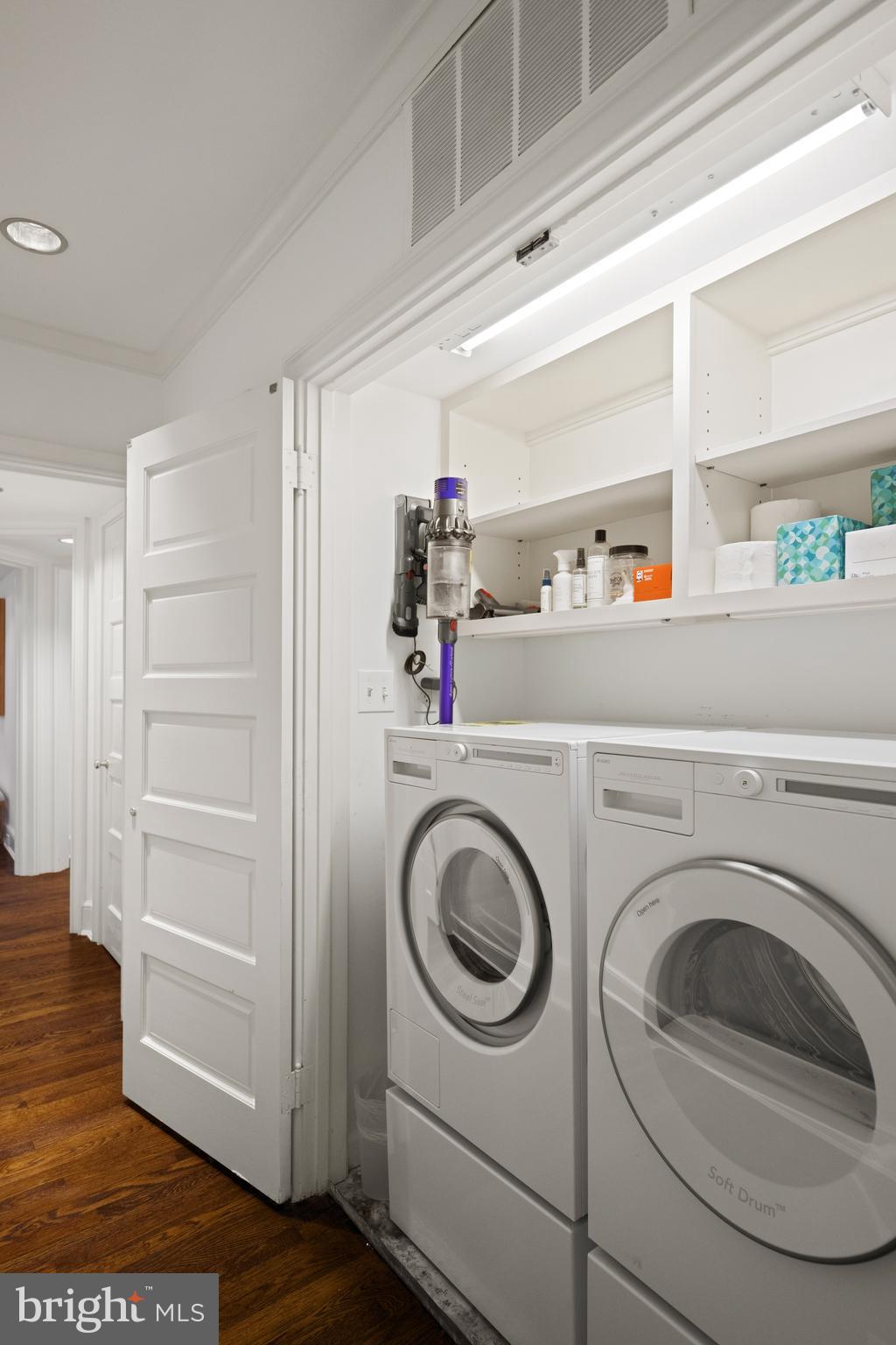 2931 Foxhall Road Northwest Washington, DC 20016 - Photo 40 of 62 a utility room with dryer and washer
