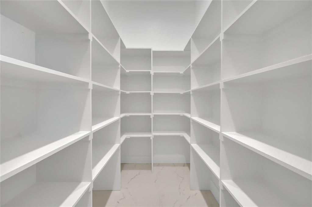 1028 Henry Way Springtown, TX 76082 - Photo 25 of 40 a view of walk in closet with empty racks