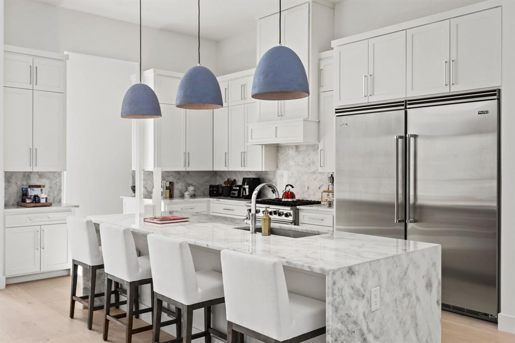 2509 Bella Ridge Keller, TX 76262 - Photo 11 of 34 a kitchen with stainless steel appliances granite countertop a sink a stove and a refrigerator