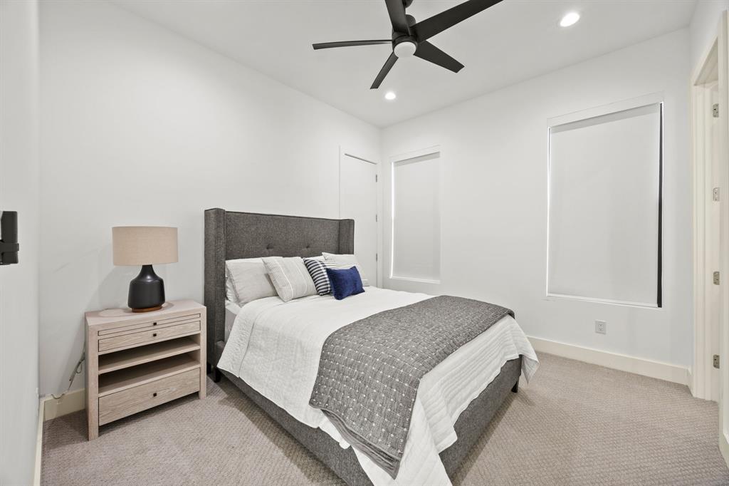 2509 Bella Ridge Keller, TX 76262 - Photo 24 of 34 a spacious bedroom with a bed and a window