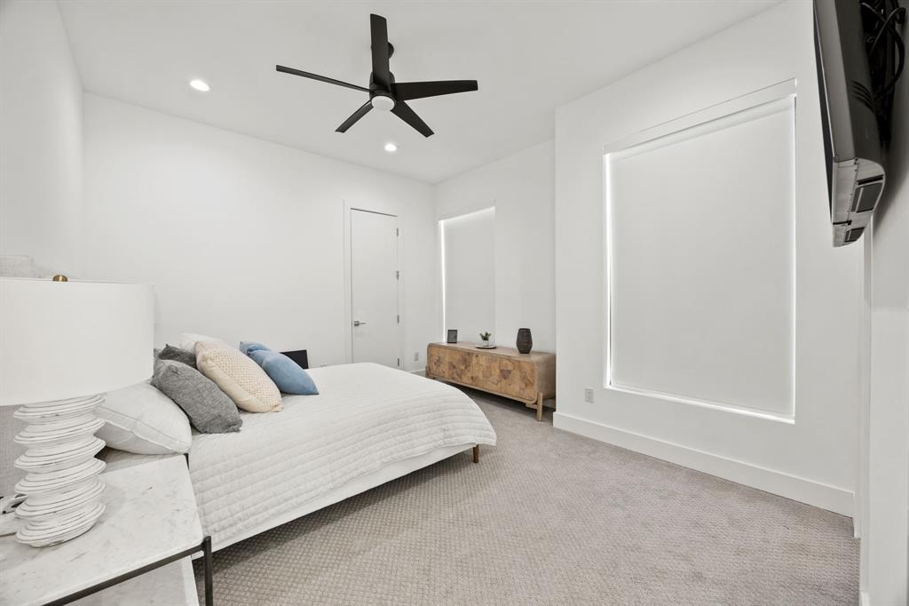 2509 Bella Ridge Keller, TX 76262 - Photo 28 of 34 a bedroom with a bed and a ceiling fan