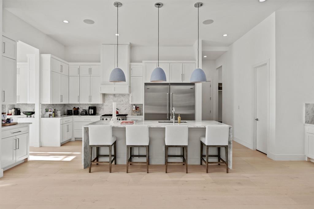 2509 Bella Ridge Keller, TX 76262 - Photo 10 of 34 a large kitchen with a table and chairs
