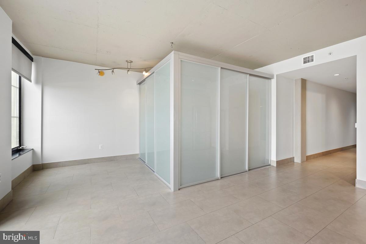 1133 14th Street Northwest, Unit 1103 Washington, DC 20005 - Photo 14 of 39 a view of an empty room