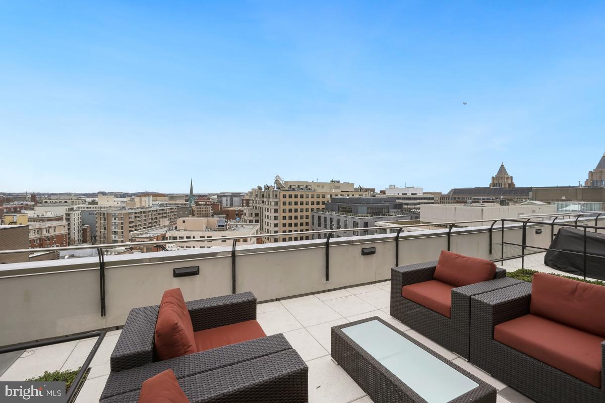1133 14th Street Northwest, Unit 1103 Washington, DC 20005 - Photo 27 of 39 a view of roof deck with seating space