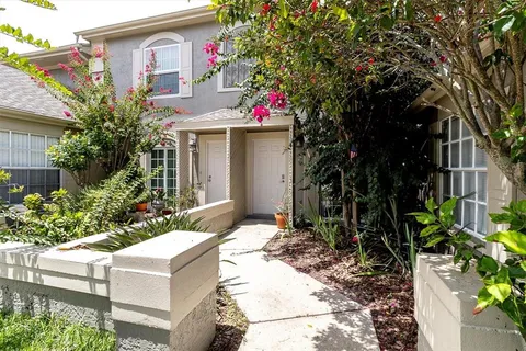 a front view of a house with yard