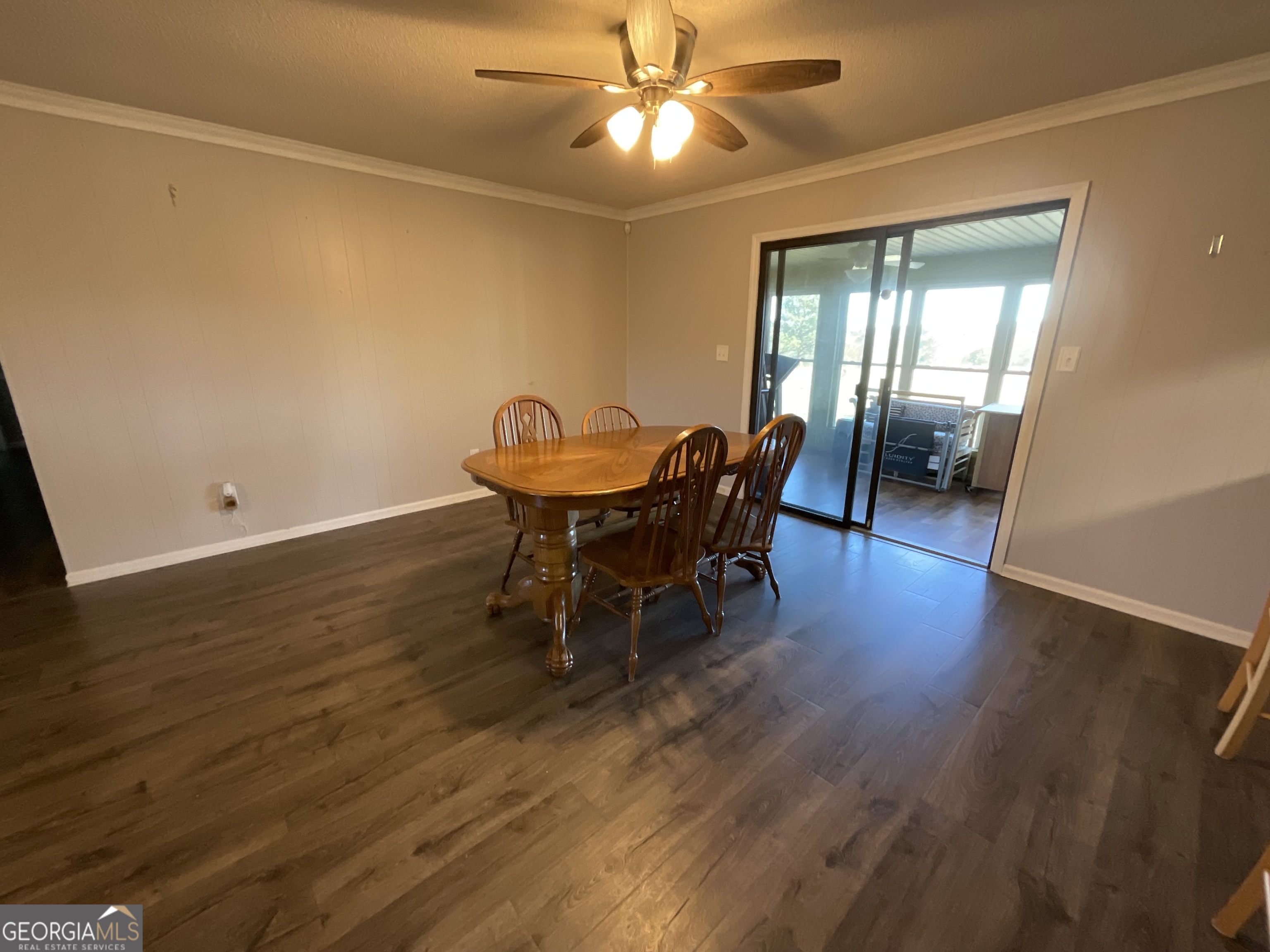 501 Raleigh Road Woodbury, GA 30293 - Photo 24 of 94 a view of a dining room with furniture and wooden floor