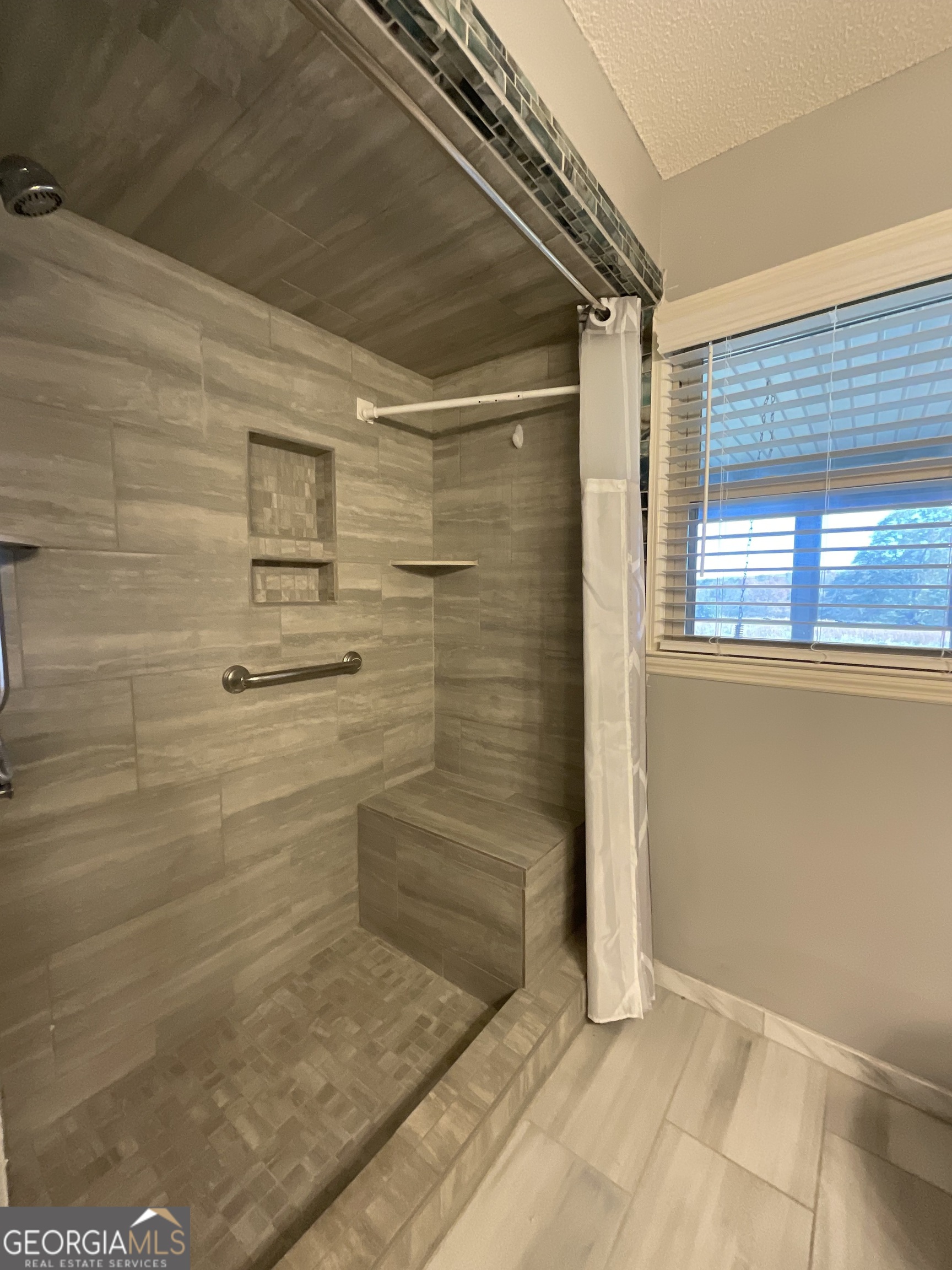 501 Raleigh Road Woodbury, GA 30293 - Photo 34 of 94 a bathroom with a shower