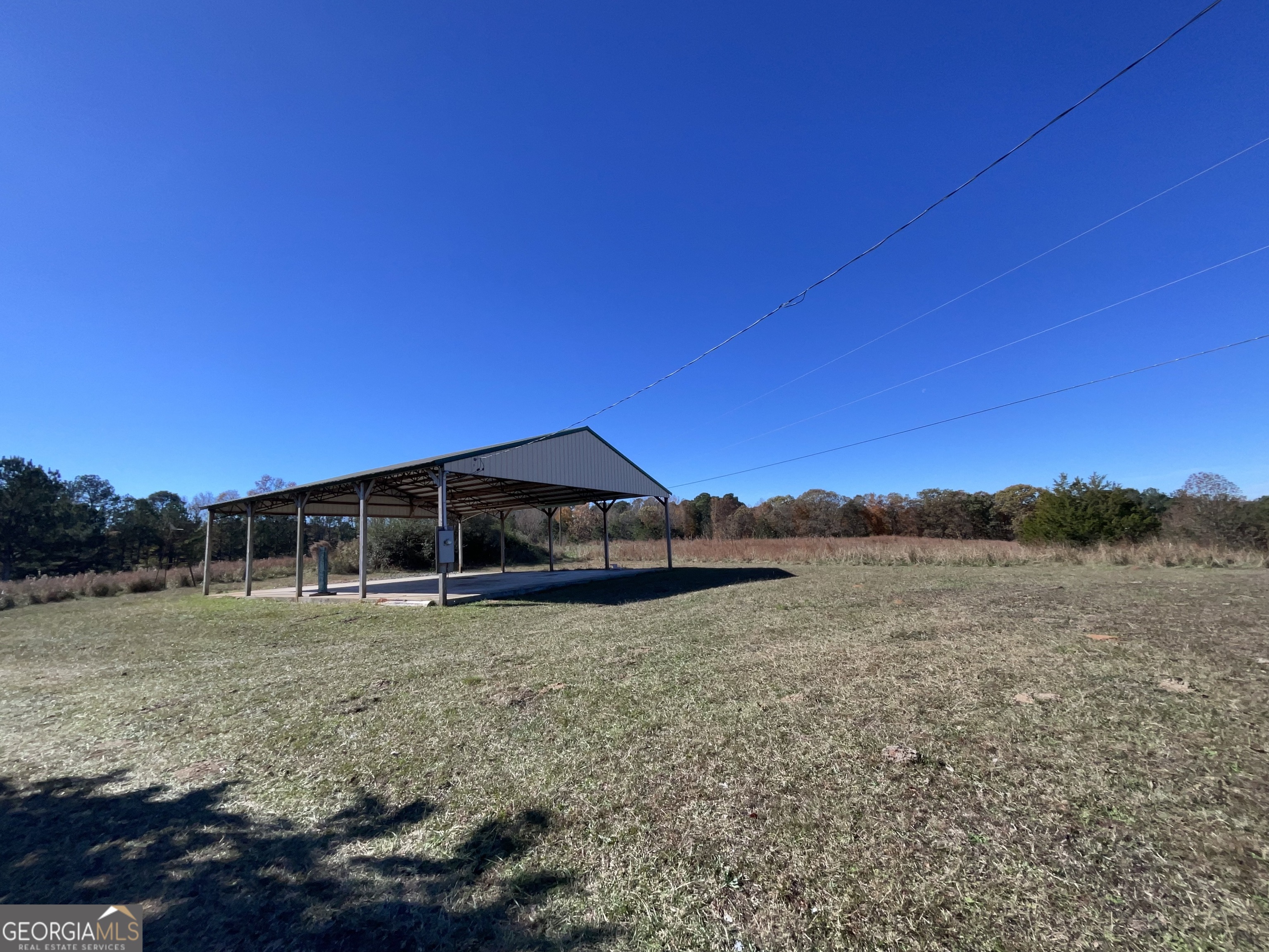 501 Raleigh Road Woodbury, GA 30293 - Photo 71 of 94 a view of a yard with wooden fence