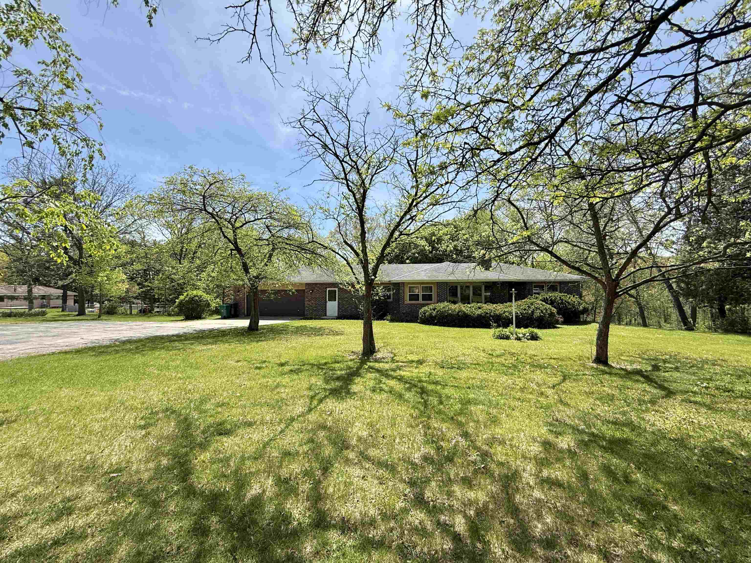 3620 Valerie Road Roscoe, IL 61073 - Photo 25 of 26 a house with lots of trees