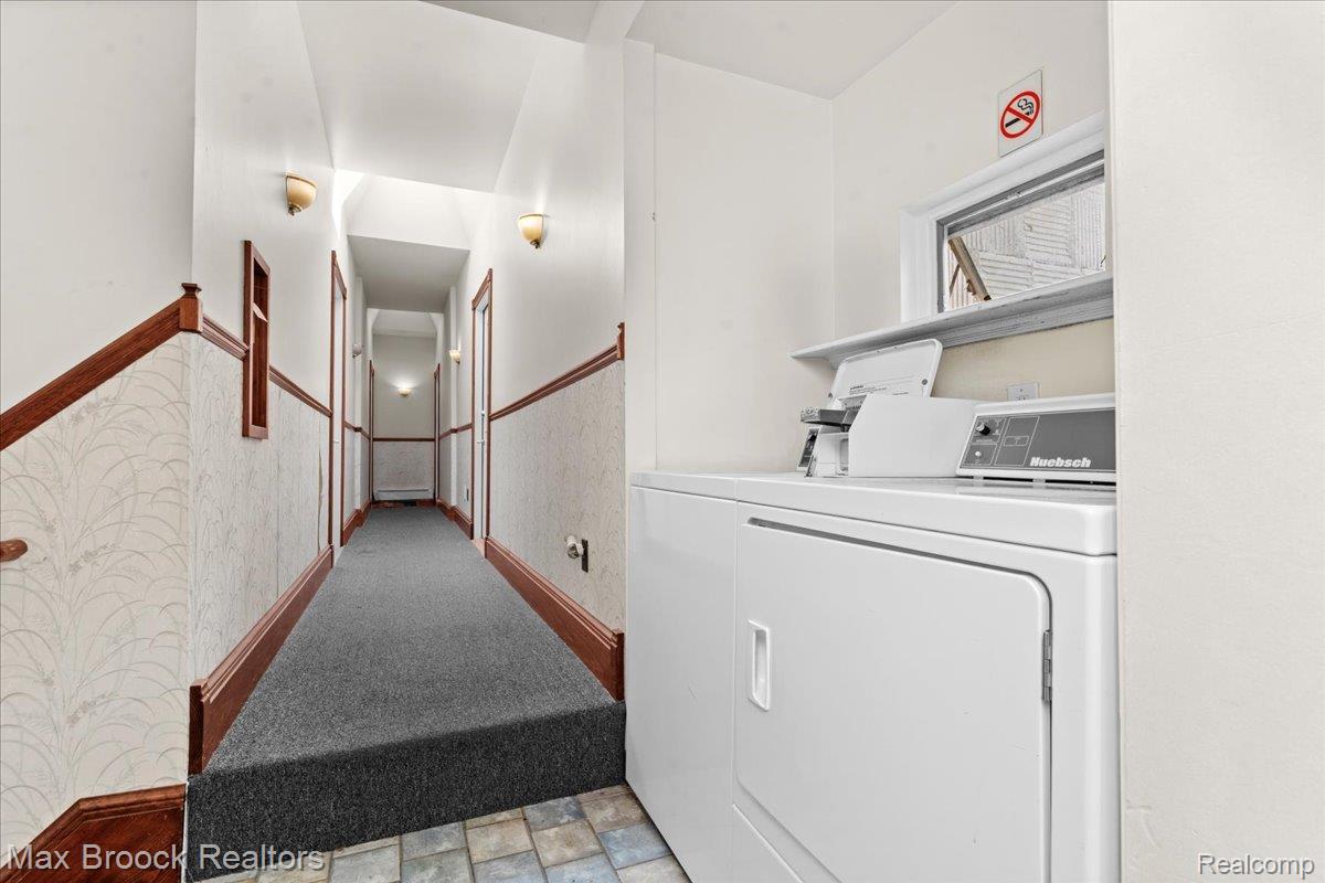 513 West 9 Mile Road, Unit 1 Hazel Park, MI 48030 - Photo 19 of 21 Coin operated laundry in hallway services 4 apartments