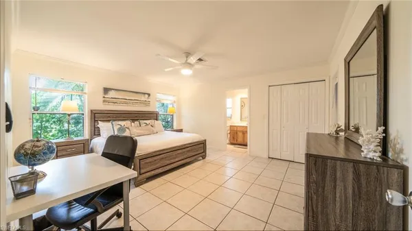 a bed room with a bed and a table