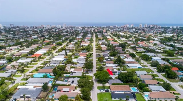 an aerial view of residential building and city
