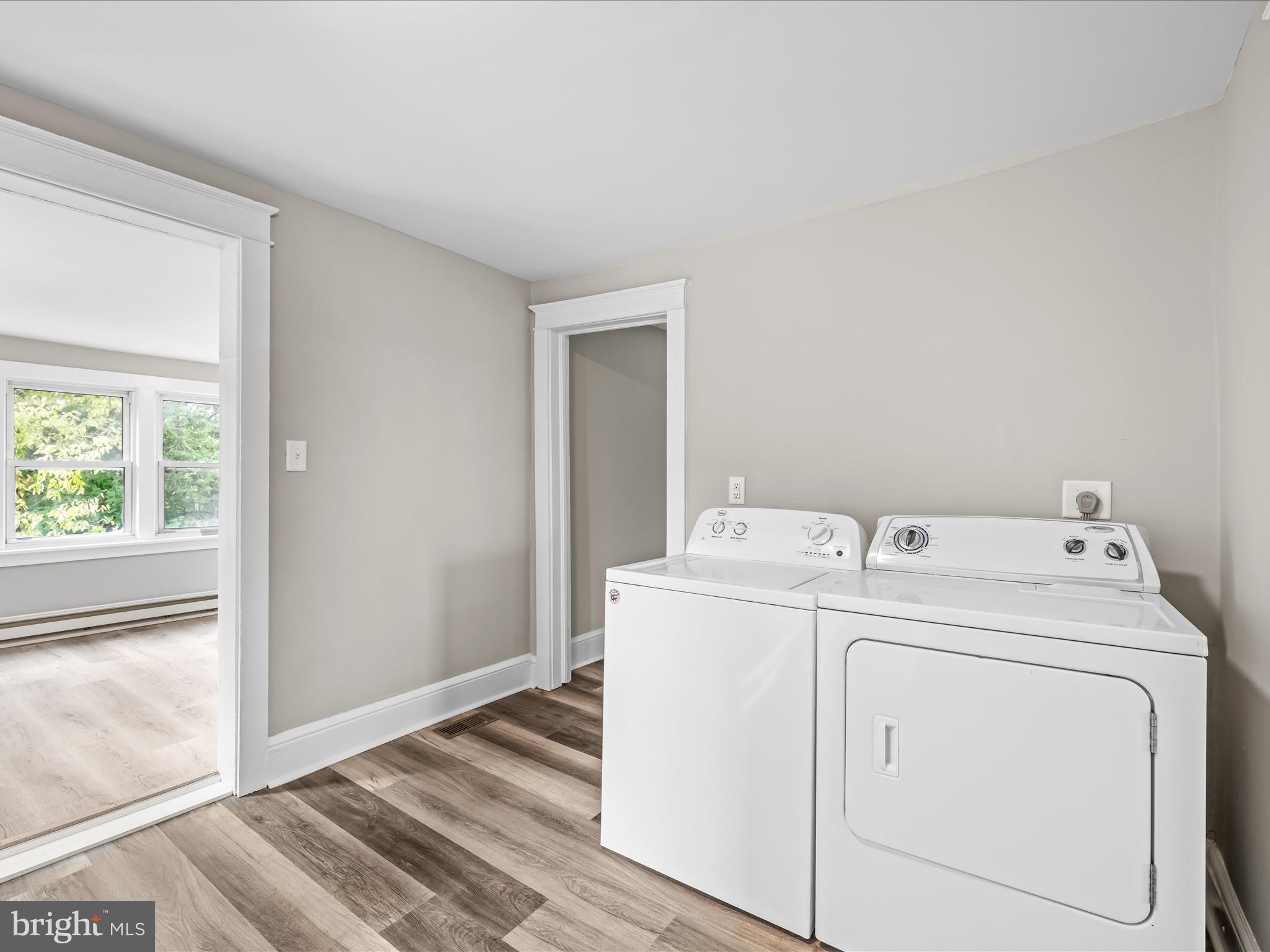 298 Bufflick Road Winchester, VA 22602 - Photo 13 of 38 a utility room with dryer and washer