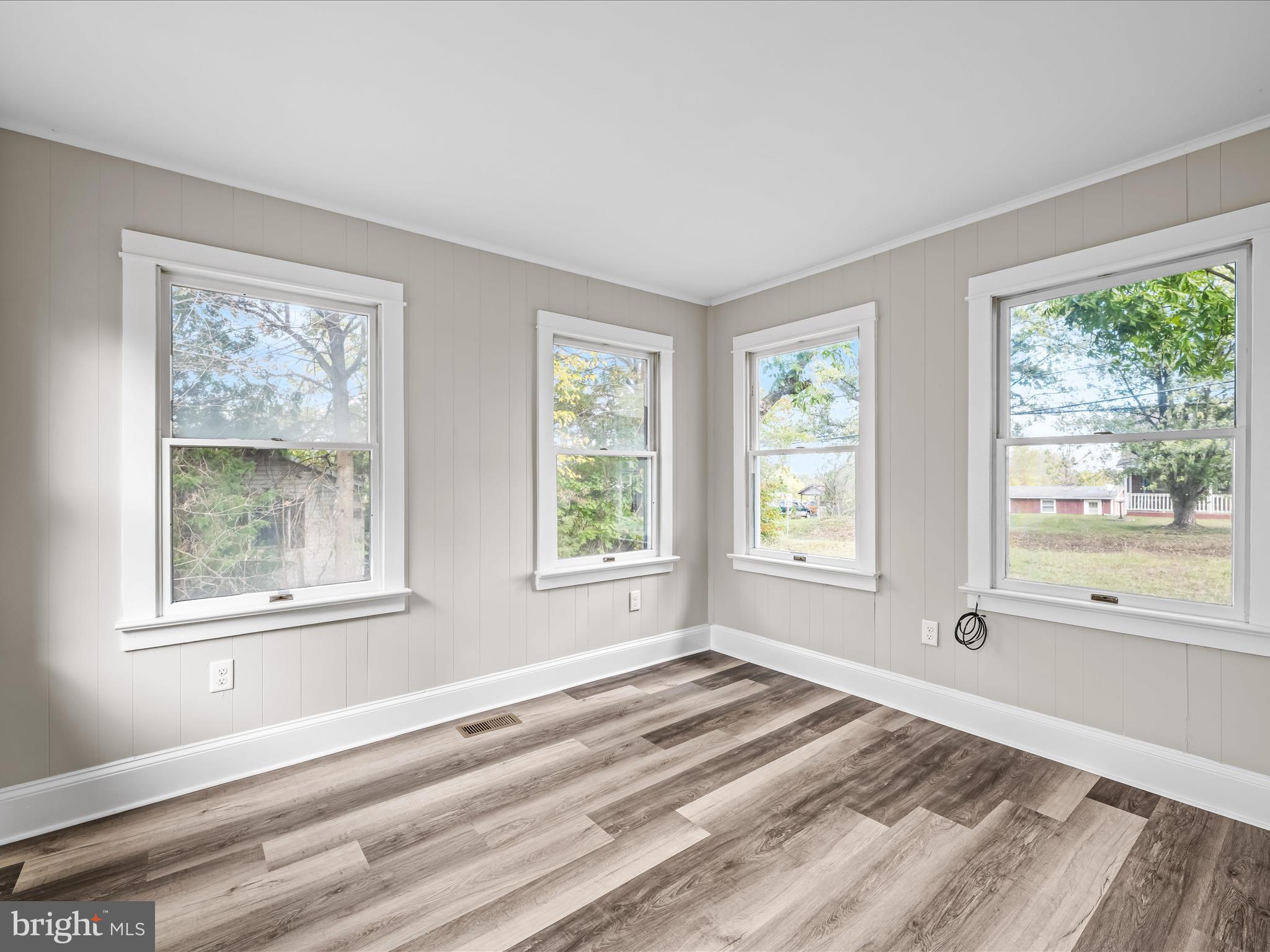 298 Bufflick Road Winchester, VA 22602 - Photo 16 of 38 a view of an empty room with a window and a bedroom