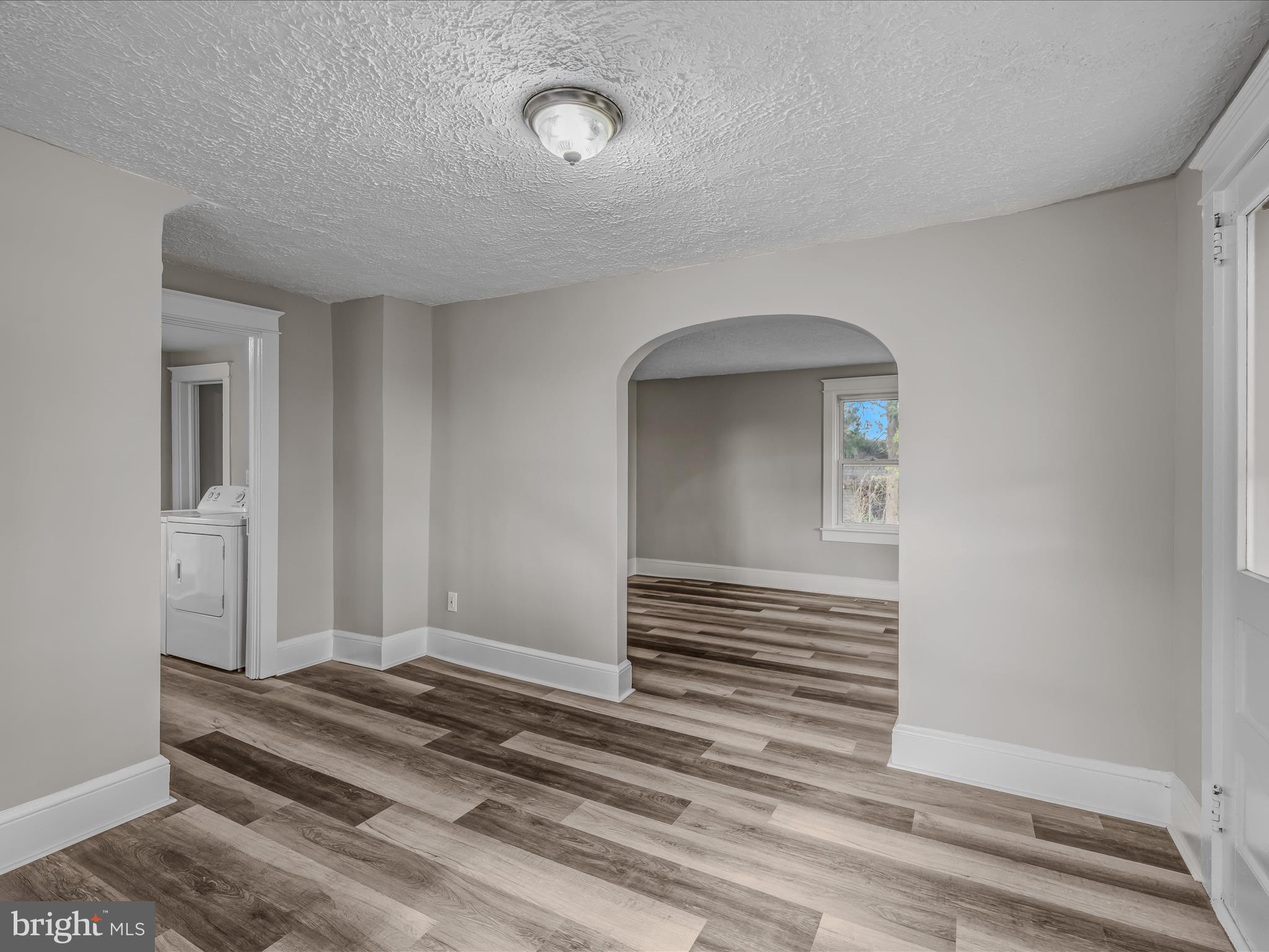 298 Bufflick Road Winchester, VA 22602 - Photo 7 of 38 a view of a livingroom with wooden floor and stairs