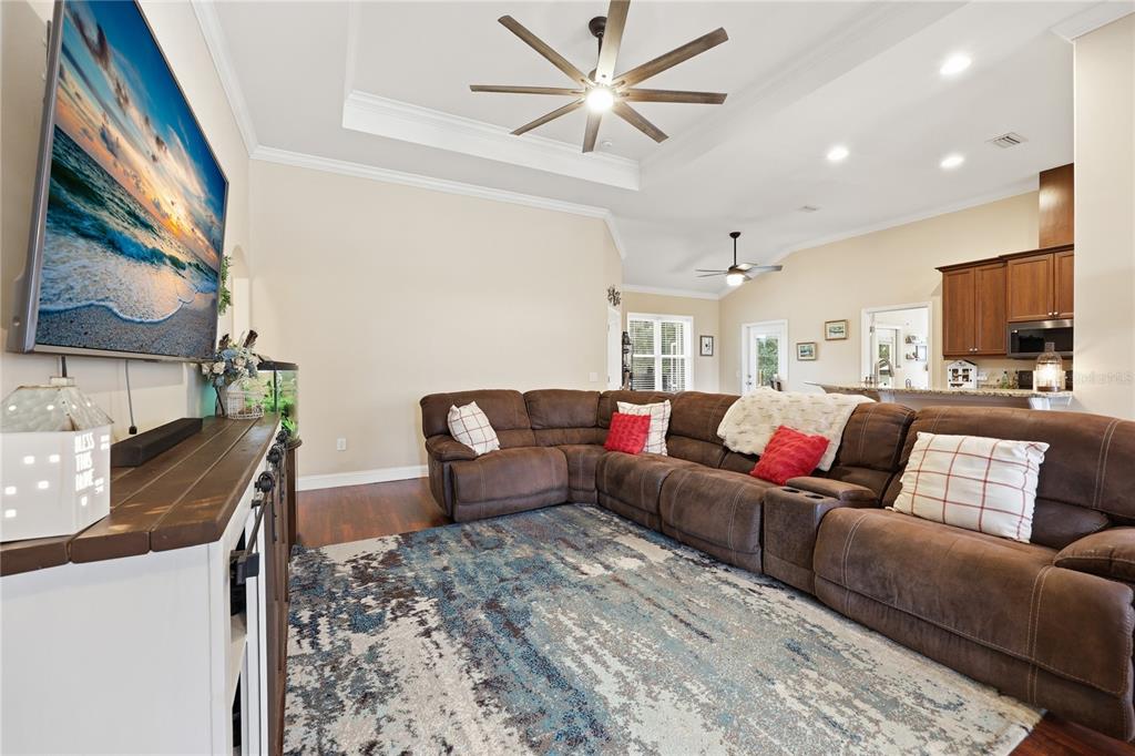 24934 Northwest 170th Road High Springs, FL 32643 - Photo 15 of 33 a living room with furniture and a flat screen tv
