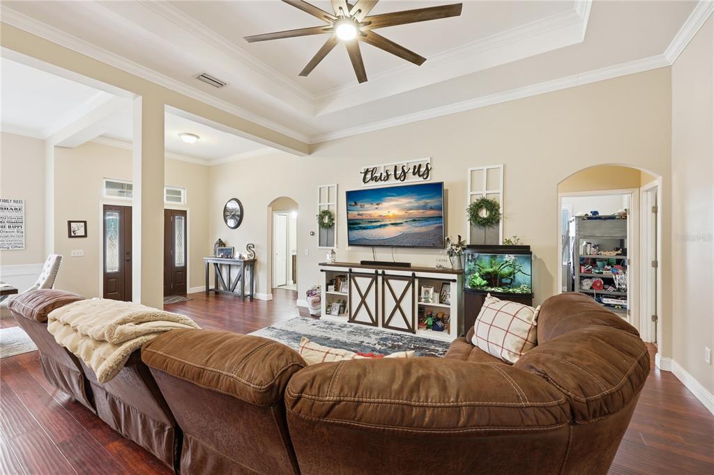 24934 Northwest 170th Road High Springs, FL 32643 - Photo 16 of 33 a living room with furniture and a flat screen tv