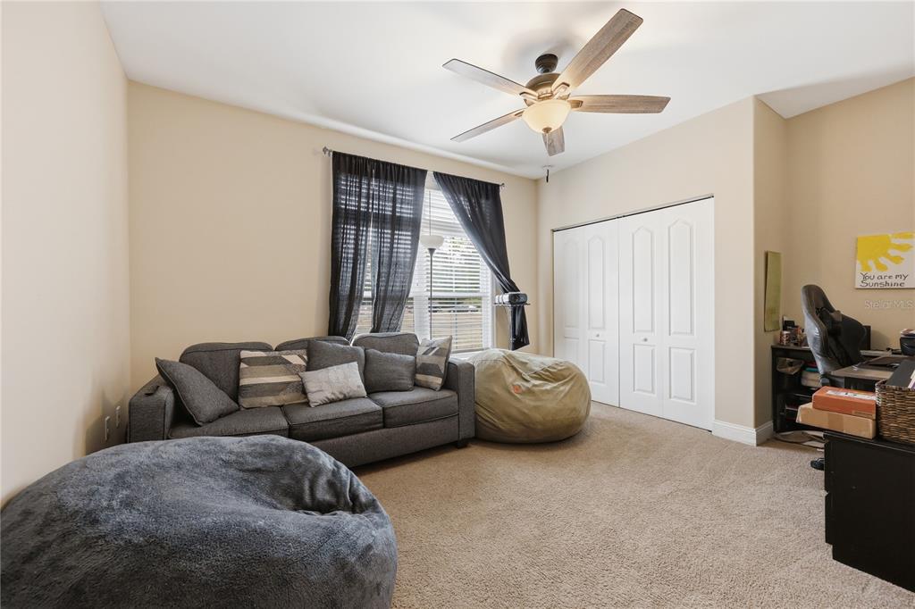 24934 Northwest 170th Road High Springs, FL 32643 - Photo 21 of 33 a living room with furniture and a window