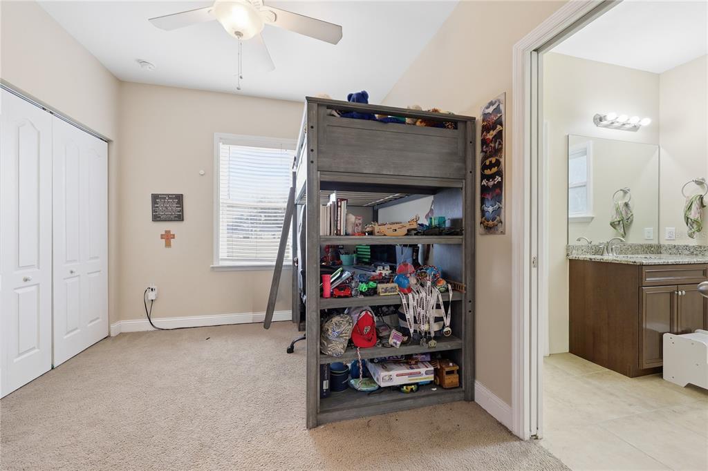 24934 Northwest 170th Road High Springs, FL 32643 - Photo 26 of 33 a view of a bedroom with closet and a window
