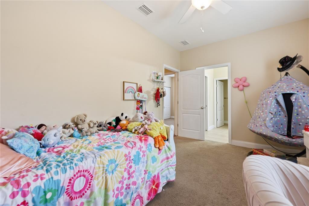 24934 Northwest 170th Road High Springs, FL 32643 - Photo 28 of 33 a bedroom with a bed a couch and dresser