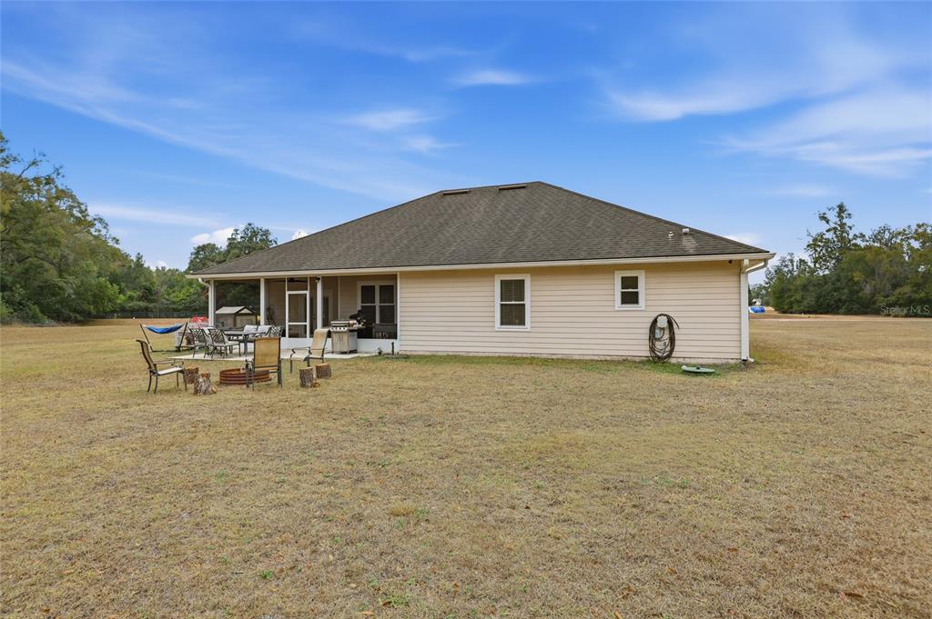 24934 Northwest 170th Road High Springs, FL 32643 - Photo 6 of 33 a house view with a garden space