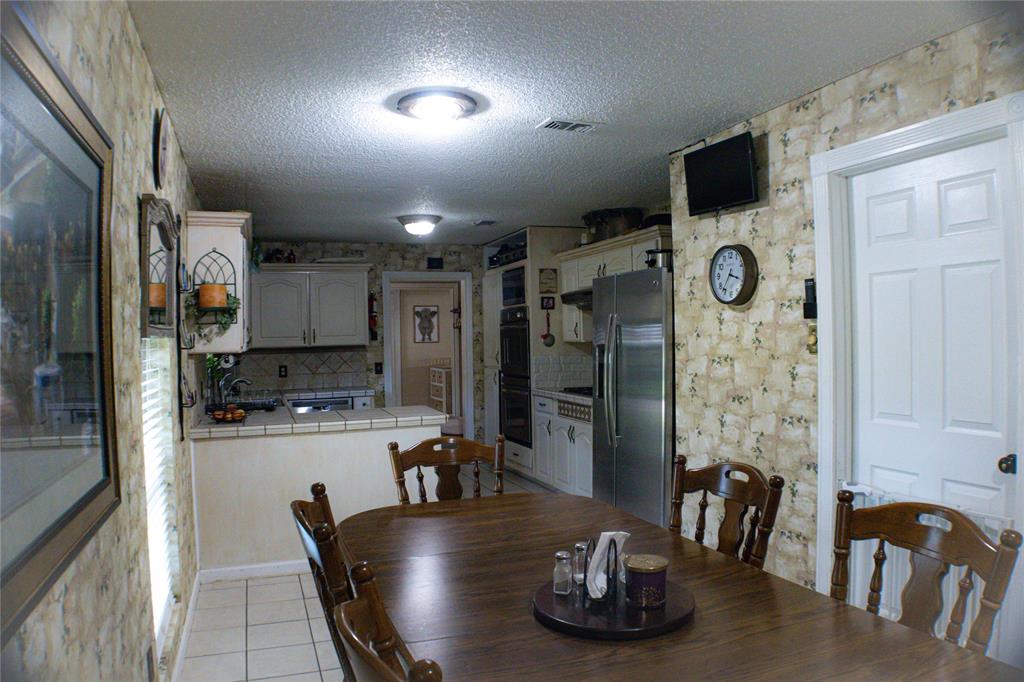 608 Field Street Colleyville, TX 76034 - Photo 6 of 28 Dining and Kitchen Area