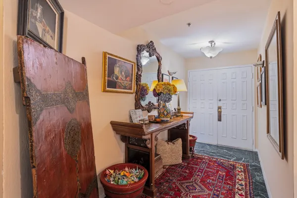 a living room with furniture and a table