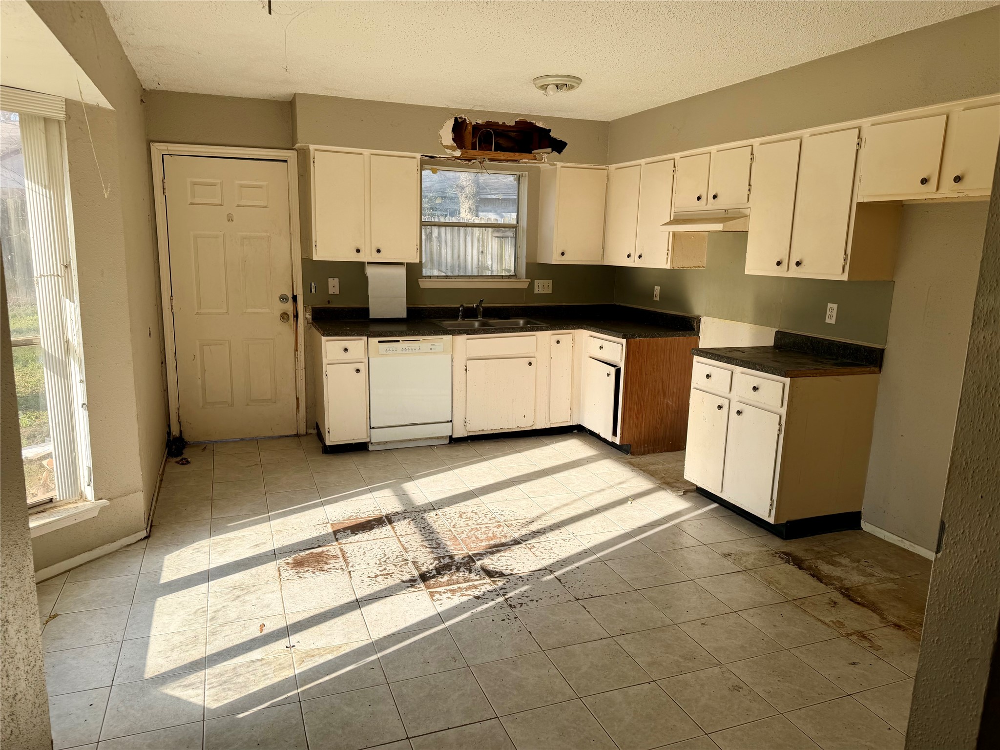 23815 Firegate Drive Spring, TX 77373 - Photo 7 of 21 a kitchen with a cabinets and white appliances