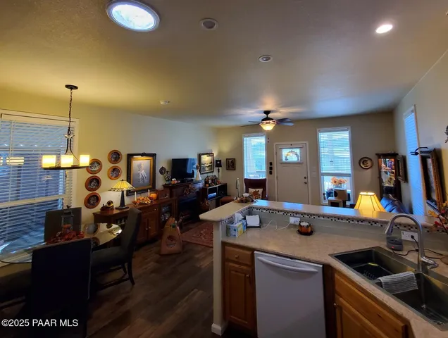 a view of a workspace with furniture