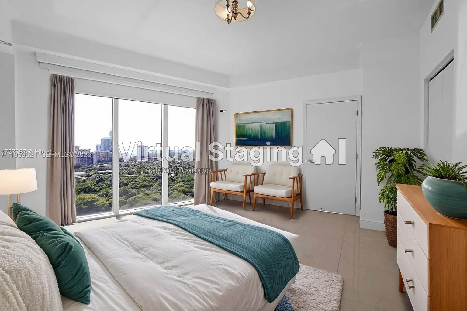 60 Southwest 13th Street, Unit 1700 Miami, FL 33130 - Photo 5 of 18 a bedroom with a bed and a flat screen tv