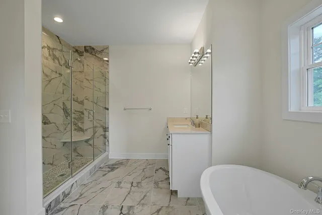 a bathroom with a shower and a toilet