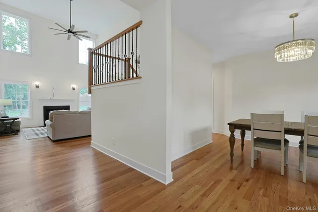 a view of a livingroom with furniture and wooden floor