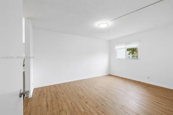 an empty room with a window